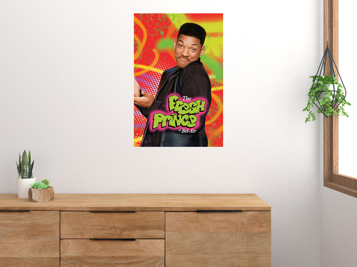 The Fresh Prince of Bel-Air Will Smith poster displayed vertically above a wooden cabinet on a light wall