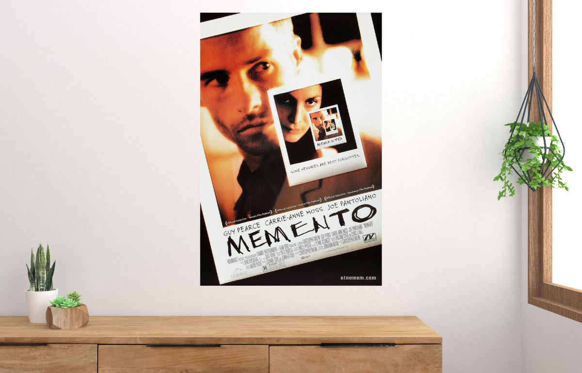 Memento thriller movie poster with fractured tones