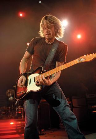 Discover Keith Urban Poster on stage guitar 16x24 The Poster Depot