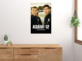 Adam-12 Season One poster displayed on a wall above a wooden cabinet