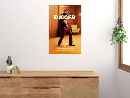 Digger movie poster displayed above a wooden sideboard in a bright room with houseplants
