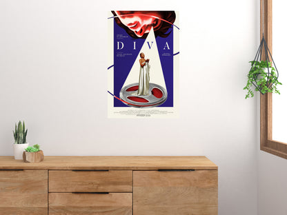 Diva opera singer and film reel poster displayed above a wooden sideboard beside plants and a window