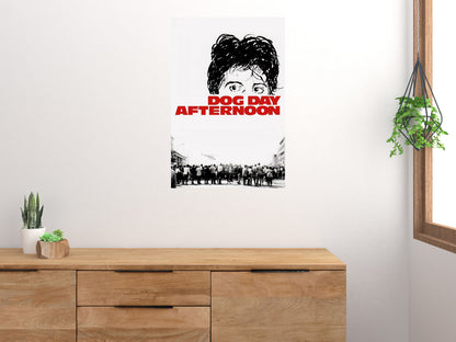 Dog Day Afternoon red title poster displayed above a wooden sideboard beside houseplants and a window
