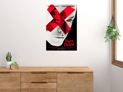 Faces of Death Red X vertical movie poster displayed on a light wall above a wooden cabinet