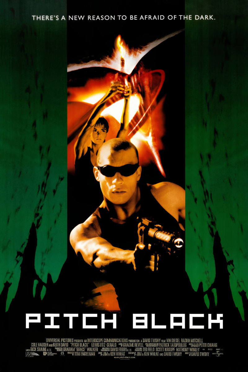 Pitch Black Movie Poster featuring shadowy terrain and intense character silhouette
