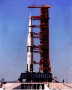 a large rocket sitting on top of a building