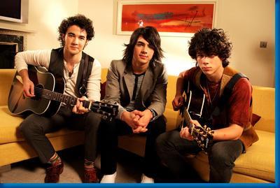 Jonas Brothers Couch Poster 27inx40in The Poster Depot